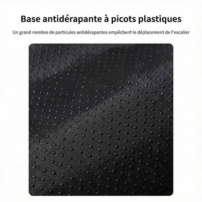 Gros plan sur le tissu noir de la base antidérapante avec picots plastiques qui empêche l'escalier de glisser au sol.